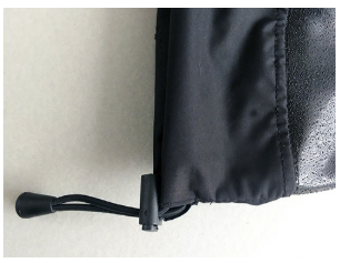Features a drawstring with a waterproof buckle at the cuff.